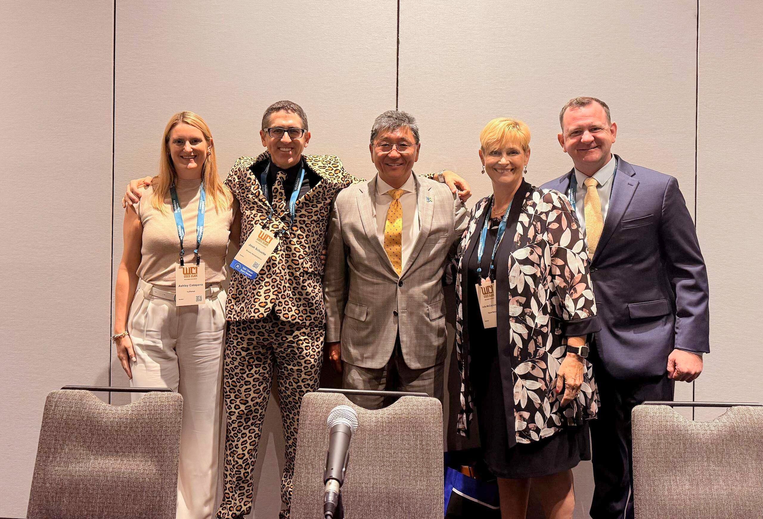 Dr. CHoo and fellow panelists posing for a photo after their panel session at WCI