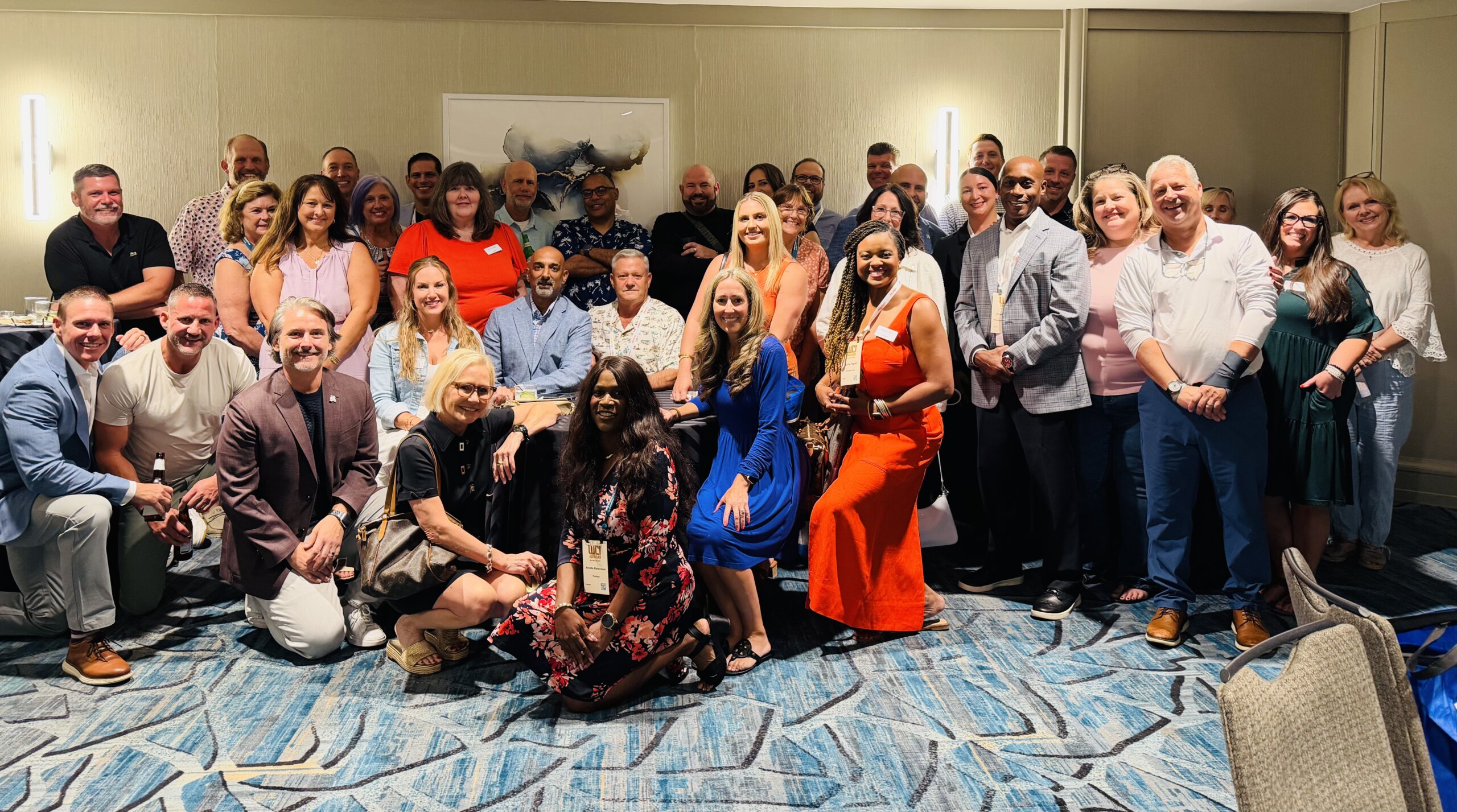 Paradigm employees posing for a photo at opening night reception
